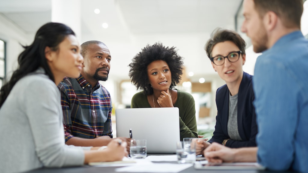 Shot of a team of colleagues having a meeting in a office